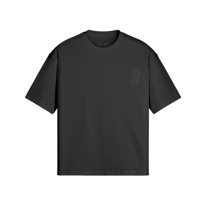 Flat lay view of Apostles Apparel Foundations Unisex Oversized Ultra Heavy Crew Neck in Black. Features a 425GSM ultra-heavyweight 100% cotton build, an architectural drop-shoulder streetwear silhouette, and high-stitch count Christ Half Face line-art embroidery on the left chest.