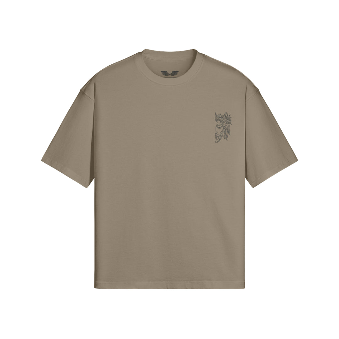 Flat lay view of Apostles Apparel Foundations Unisex Oversized Ultra Heavy Crew Neck in Brown. Features a 425GSM ultra-heavyweight 100% cotton build, an architectural drop-shoulder streetwear silhouette, and high-stitch count Christ Half Face line-art embroidery on the left chest.