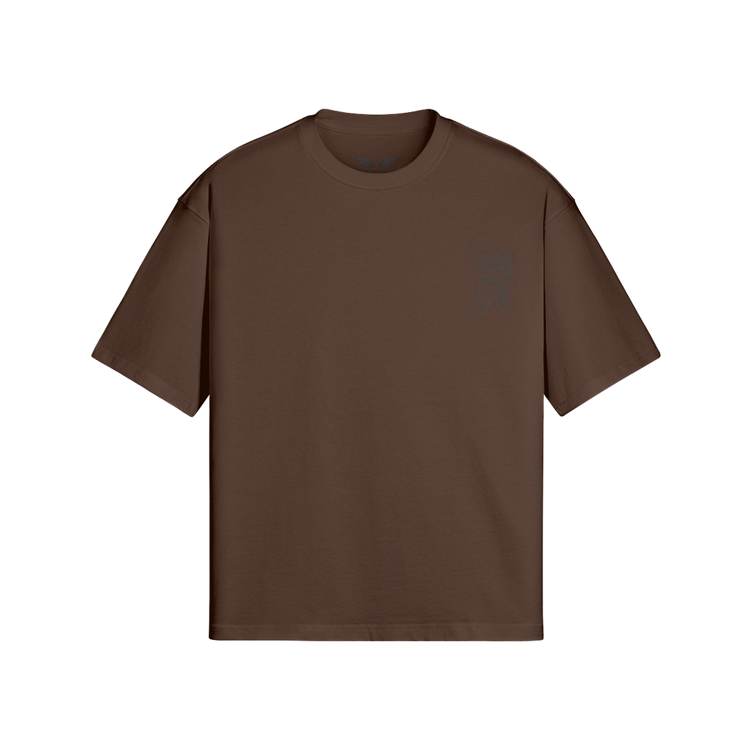 Front studio flat lay view of the Foundations Series Unisex Embroidered Boxy Tee in a deep dark brown tone, designed as premium Christian streetwear. Features a relaxed, architectural boxy silhouette with dropped shoulders engineered from massive 280GSM heavyweight combed cotton, highlighted by the high-stitch count Christ Half Face line-art embroidery on the chest and a heavy-duty double-stitched ribbed collar for a mission-driven Christian clothing statement piece.