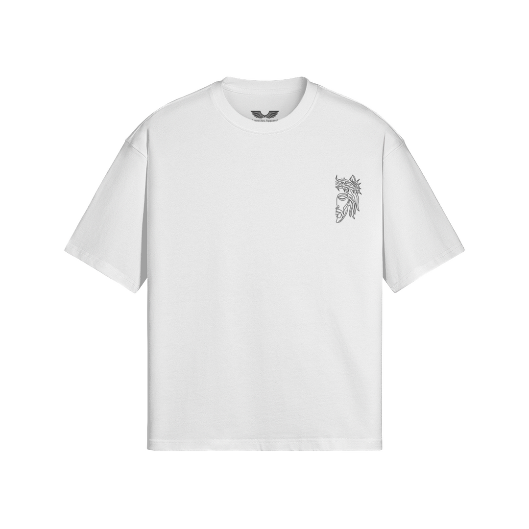 Front studio flat lay view of the Foundations Series Unisex Embroidered Boxy Tee in white, designed as premium Christian streetwear. Features a relaxed, architectural boxy silhouette with dropped shoulders engineered from massive 280GSM heavyweight combed cotton, highlighted by the high-stitch count Christ Half Face line-art embroidery on the chest and a heavy-duty double-stitched ribbed collar for a mission-driven Christian clothing statement piece.