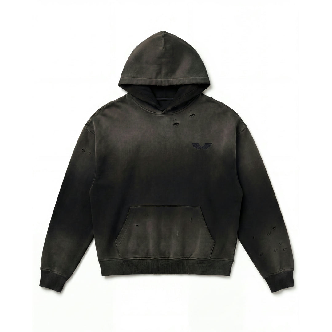 Front studio flat lay view of the Foundations Series Crown of Thorns Heavyweight Hoodie in faded and distressed black. Features the minimalist embroidered brand wings logo on the chest, hand-distressed grinding on the hood, chest, sleeves, and kangaroo pouch pocket, showcasing the ultra-dense 440GSM combed cotton texture and boxy silhouette.