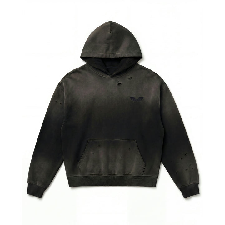 Front studio flat lay view of the Foundations Series Crown of Thorns Heavyweight Hoodie in faded and distressed black. Features the minimalist embroidered brand wings logo on the chest, hand-distressed grinding on the hood, chest, sleeves, and kangaroo pouch pocket, showcasing the ultra-dense 440GSM combed cotton texture and boxy silhouette.
