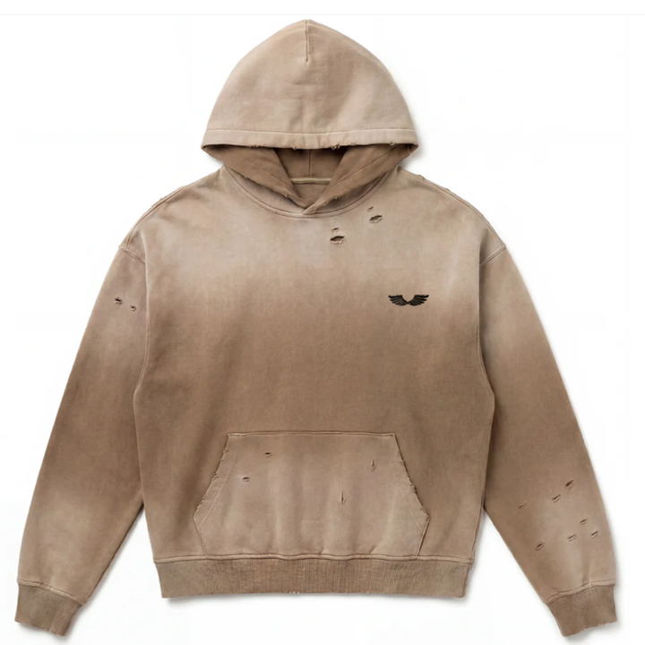 Front studio flat lay view of the Foundations Series Crown of Thorns Heavyweight Hoodie in faded and distressed camel. Features the minimalist embroidered brand wings logo on the chest, hand-distressed grinding on the hood, chest, sleeves, and kangaroo pouch pocket, showcasing the ultra-dense 440GSM combed cotton texture and boxy silhouette.